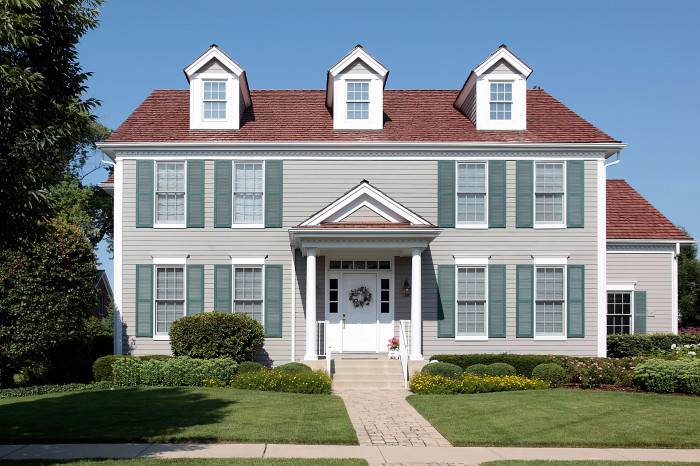 Suburban home with green shutters