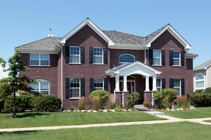 Brick home with arched entry